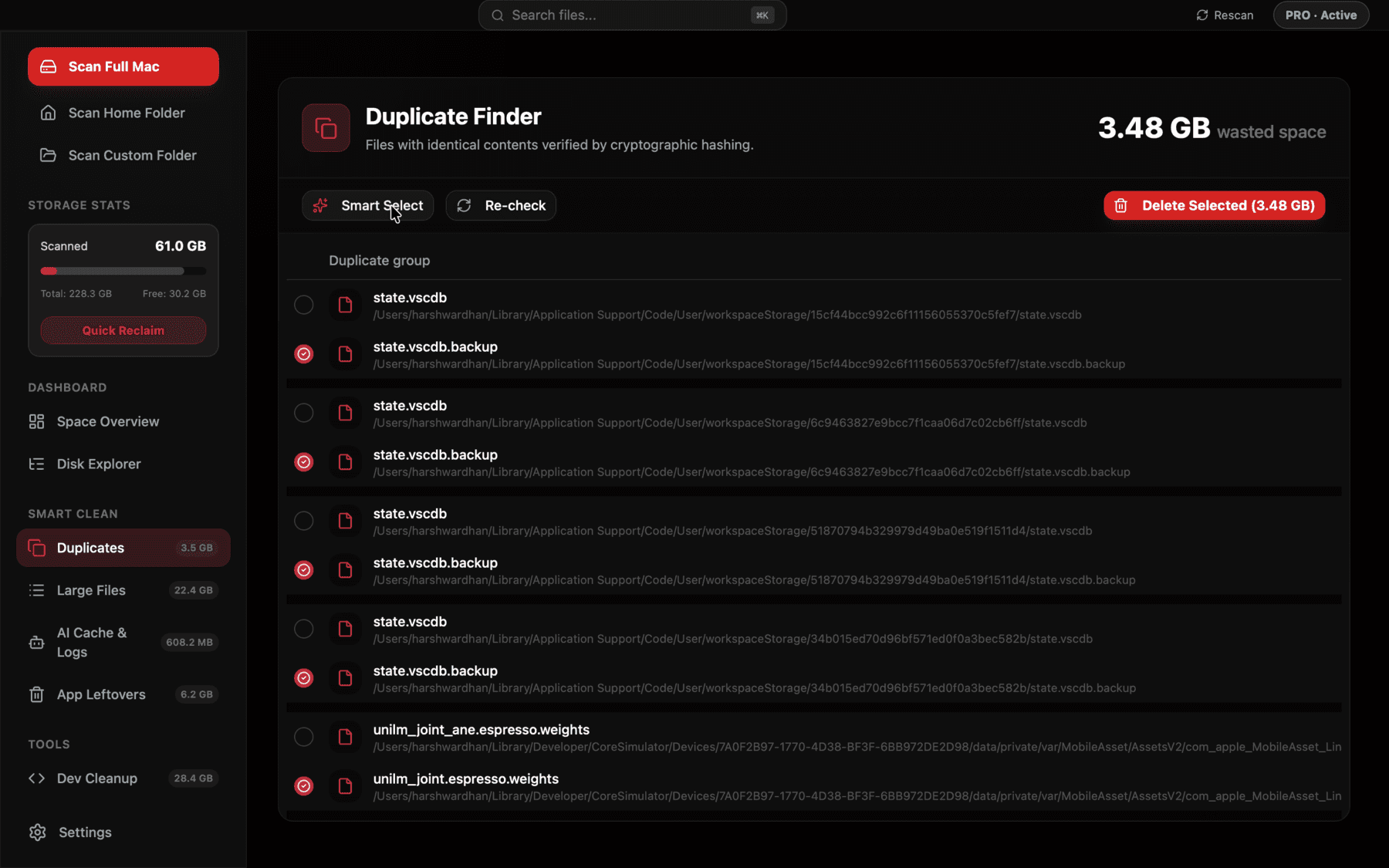 Duplicate files view showing grouped identical files with previews and sizes